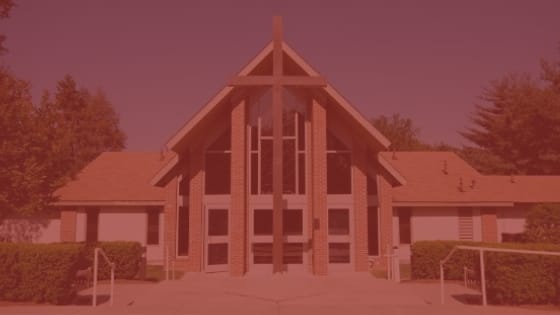 Image of the exterior of a church with red overlay