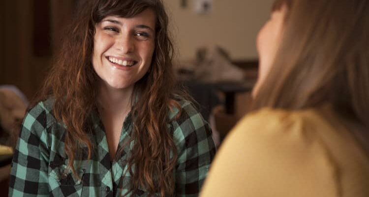 Woman Talking and Smiling